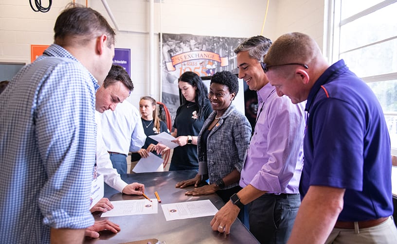 Faculty and staff members work together on a project at Clemson.
