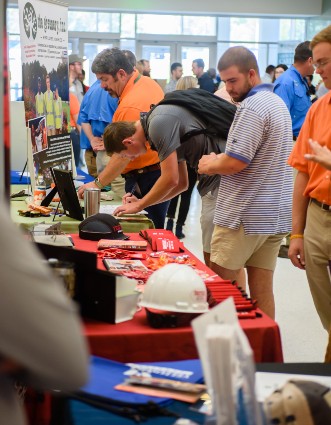 Students browsing at the College of Agriculture Forestry and Life Sciences career fair.