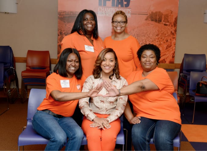 African American Clemson alumni pose during a professional development event
