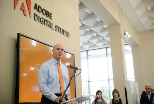 Clemson President Jim Clements addresses industry professionals in the Adobe Digital Studio.