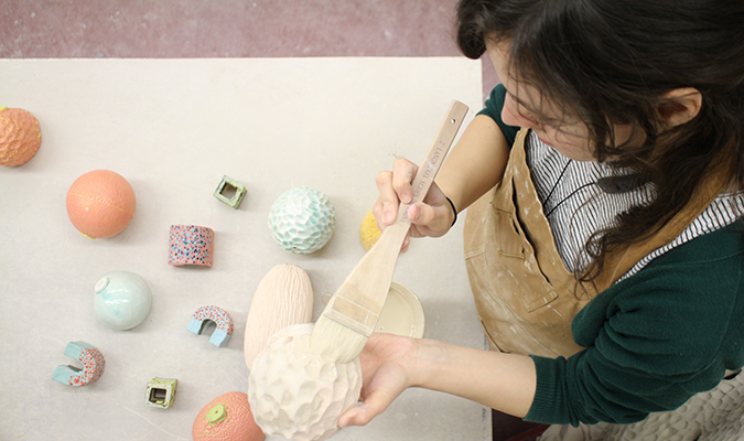 Image of student in ceramics studio