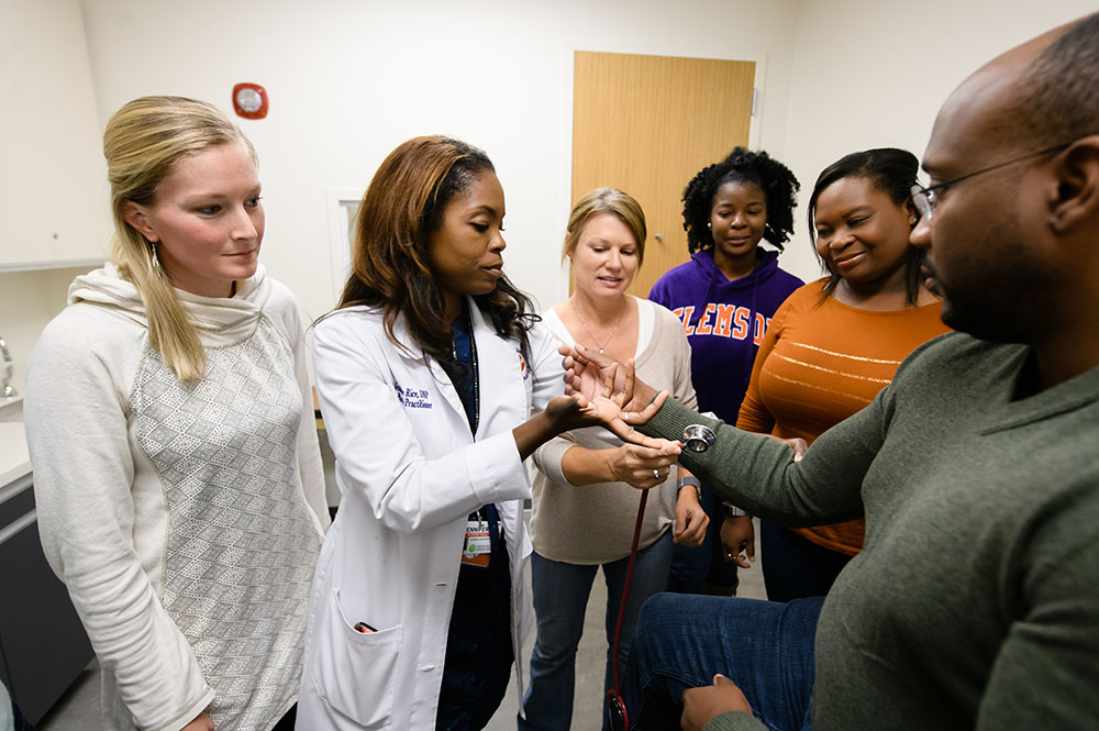 Student and a teacher in the Clemson Doctor of Nursing Practice degree