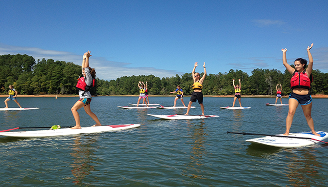 Picture of students paddle boarding at Lake Hartwell.