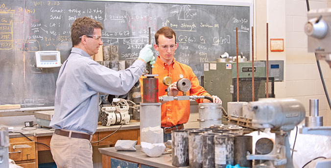 Student and faculty member in lab in Lowry.
