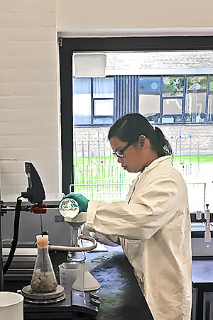 Female student in lab in Denmark Unit Ops lab.