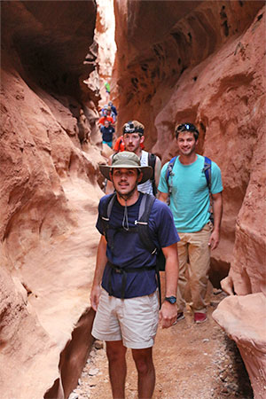 Group of students in rock canyon.