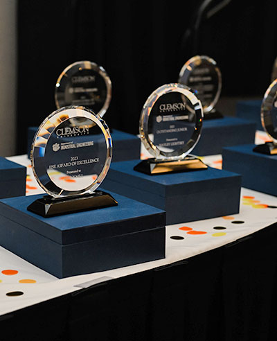 Glass awards on table at annual awards event.