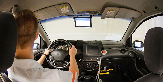 Student in driver simulator