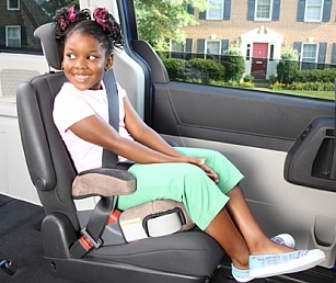 Girl in child passenger seat