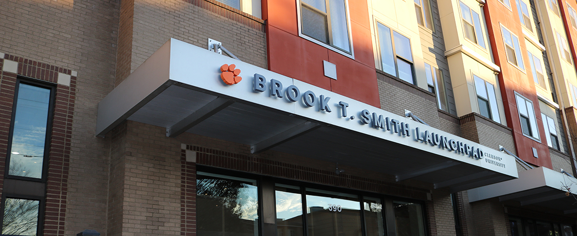 Street view of the Brook T. Smith sign over the building