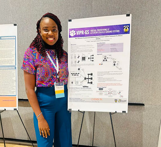 Aideyan with winning poster