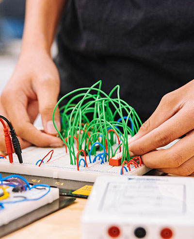 close-up of person working with circuits