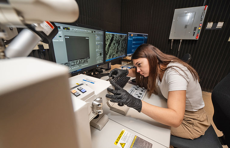 Inside the Electron Microscopy Lab, with different scans on multiple computer screens.
