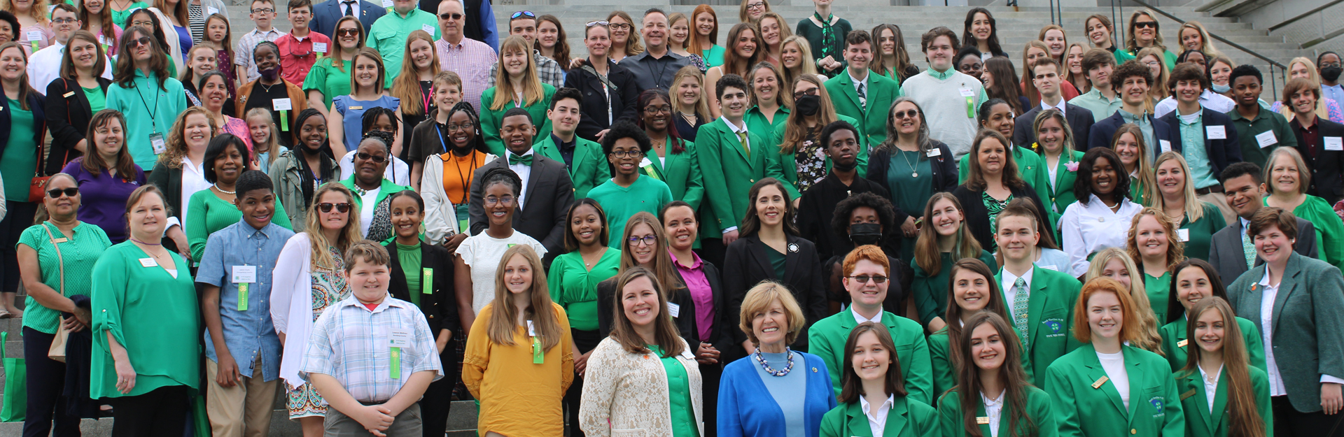 large group photo of pinckney leadership students standing on the south caorolina statehouse steps