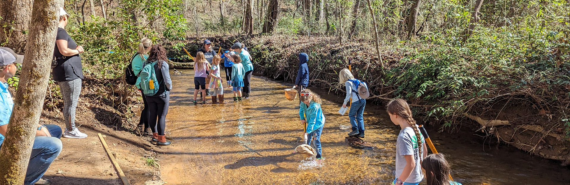 kids exploring the river during 4-H20 summer camp