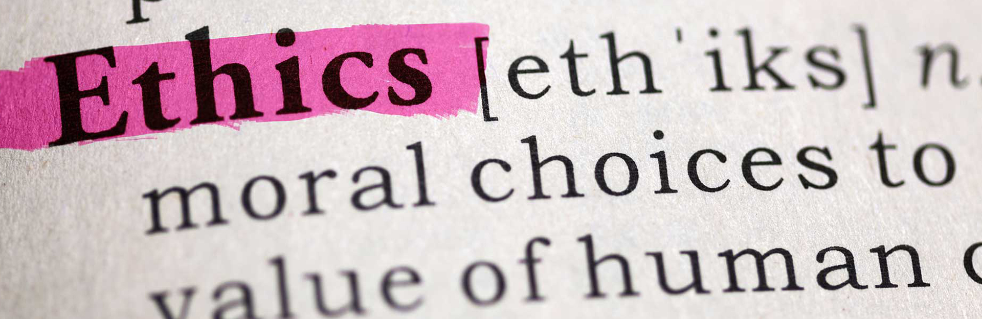 picture of a page from a dictionary with the word ethics highlighted and a portion of the definition, intended to be artistic not legible 