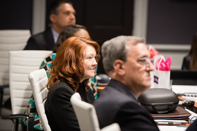 Several employees at meeting