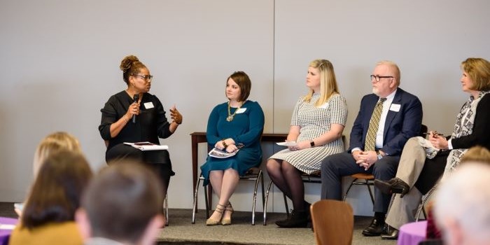 A group panel having a discussion