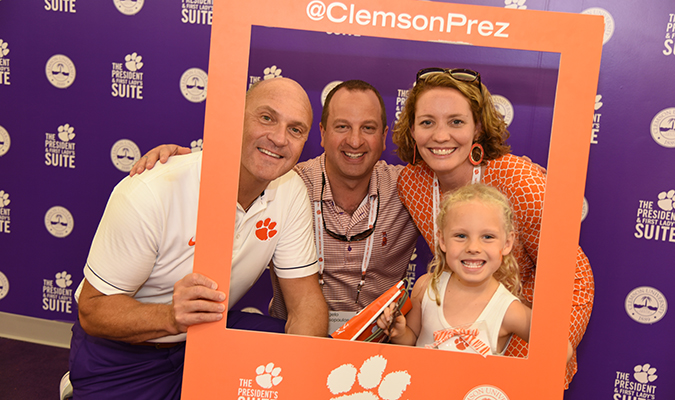 Angelo, Heather and Zoie Mitsopoulos with President Jim Clements