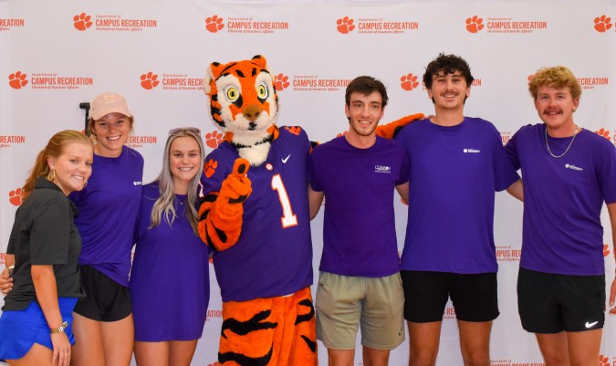 Student employees with the Clemson tiger mascot