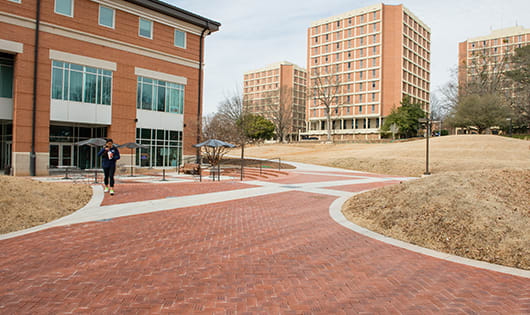 The brick sidewalk beside Hendrix Student Center is engraved with the names of Clemson alumni.