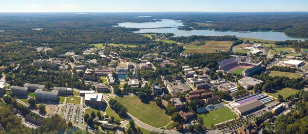 An aerial shot shows Clemson's campus, Lake Hartwell and the Blue Ridge Mountains.
