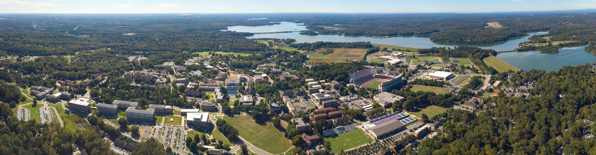 An aerial shot shows Clemson's campus, Lake Hartwell and the Blue Ridge Mountains.