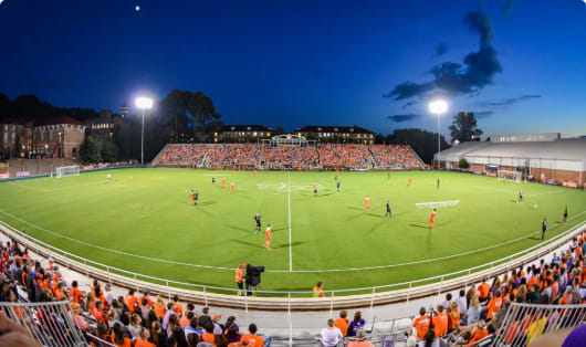 The stands are full during a soccer game at Riggs Field.