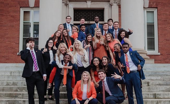 Members of Clemson's student government pose together on the steps of Sikes.