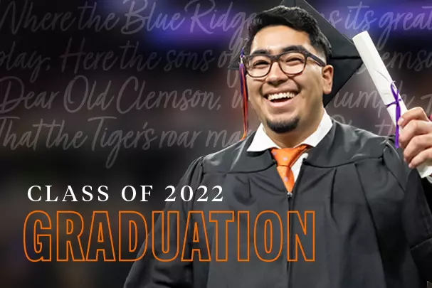 A recent clemson graduate holds up a diploma behind text that reads, Class of 2022 Graduation