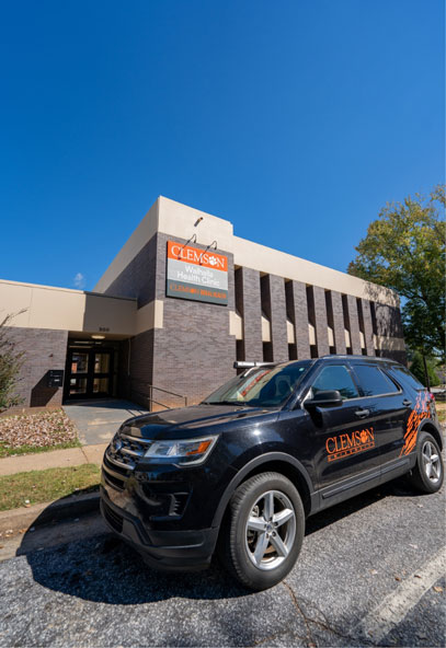 The Clemson Rural Health vehicle parked in front of the Walhalla Health Clinic.