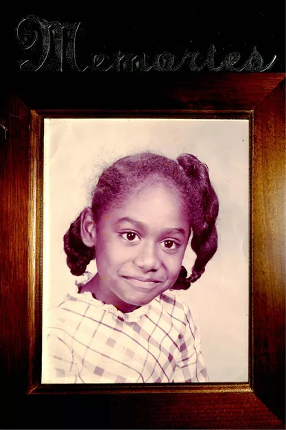 A photo frame with cursive decoration that reads 'Memories' displays a photo of Vanessa Wyche in the first grade