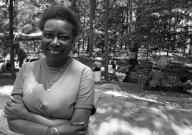 Photograph of Carrel Cowan-Ricks at the African American Burial Ground at Woodland Cemetery in the early 1990s.