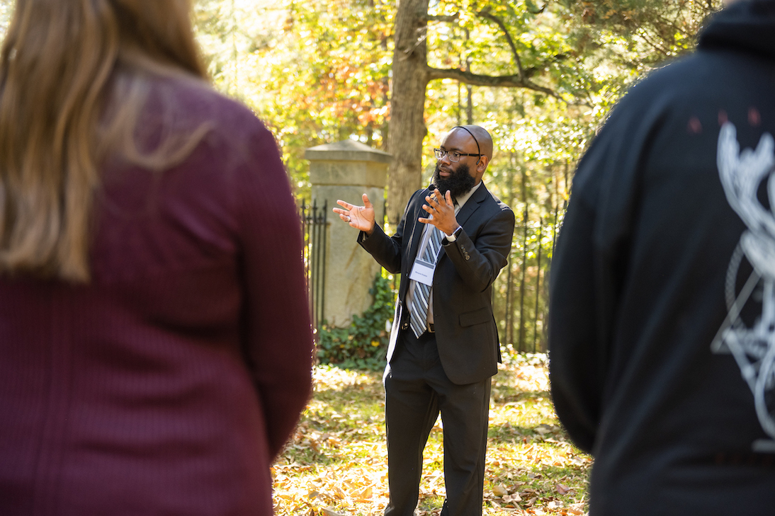 A tour guide speaking to a group.