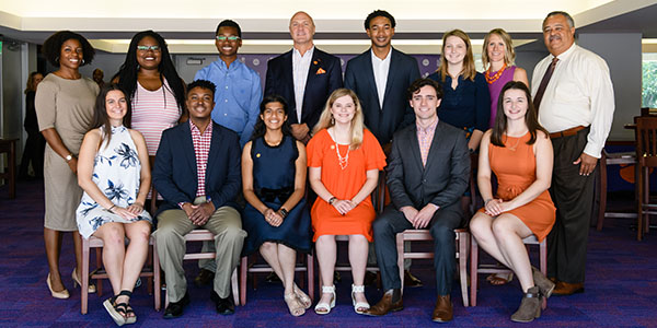 National Scholars posting with President Clements and Max Allen at the National Scholars luncheon in October 2019.