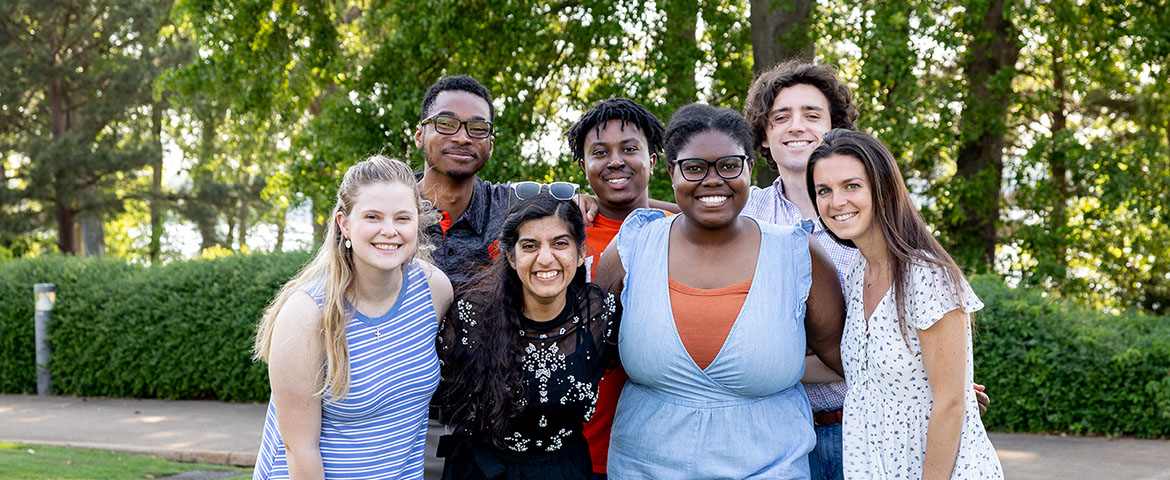 A group of National Scholars posing together outside