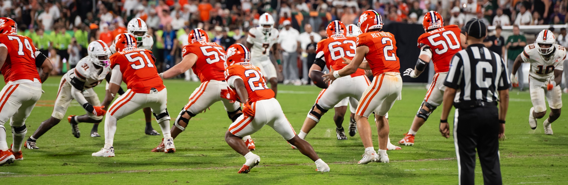 Clemson men's football team in game playing against the University of Miami in memorial stadium.