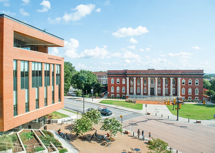 An aerial view of campus, featuring the Wilbur O. and Ann Powers College of Business, an intersection, and Sikes Hall.