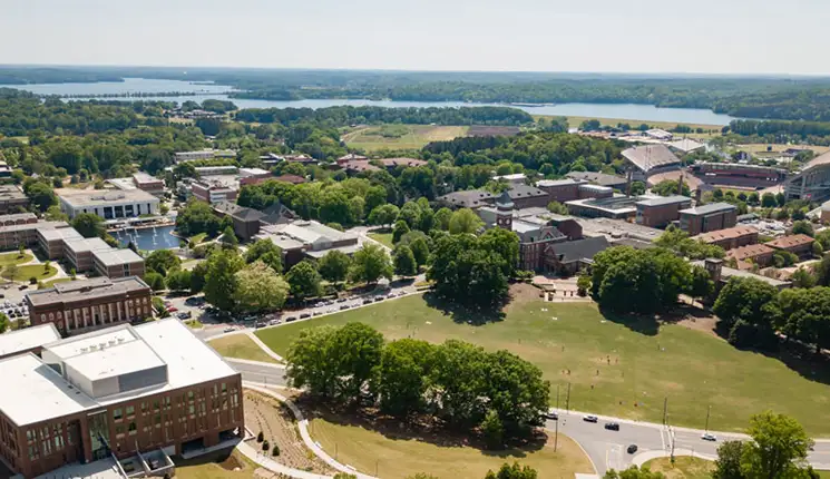 Aerial photograph of Clemson campus encompassing Bowman field, the North Green, West Campus and Memorial Stadium.