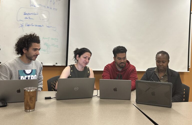 Mostafa Saberia, a civil engineering doctoral student; Vidya Samadi, assistant professor; Praneeth Dulam, a computer science master’s student and Lisa Umutoni, an agricultural sciences doctoral student, analyze data to use for developing a flood evacuation tool for South Carolina residents.
