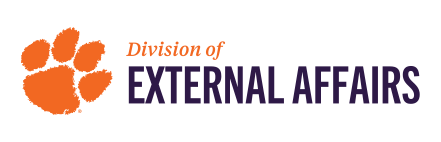 Sample Division of External Affairs Wordmark, orange and purple on white background