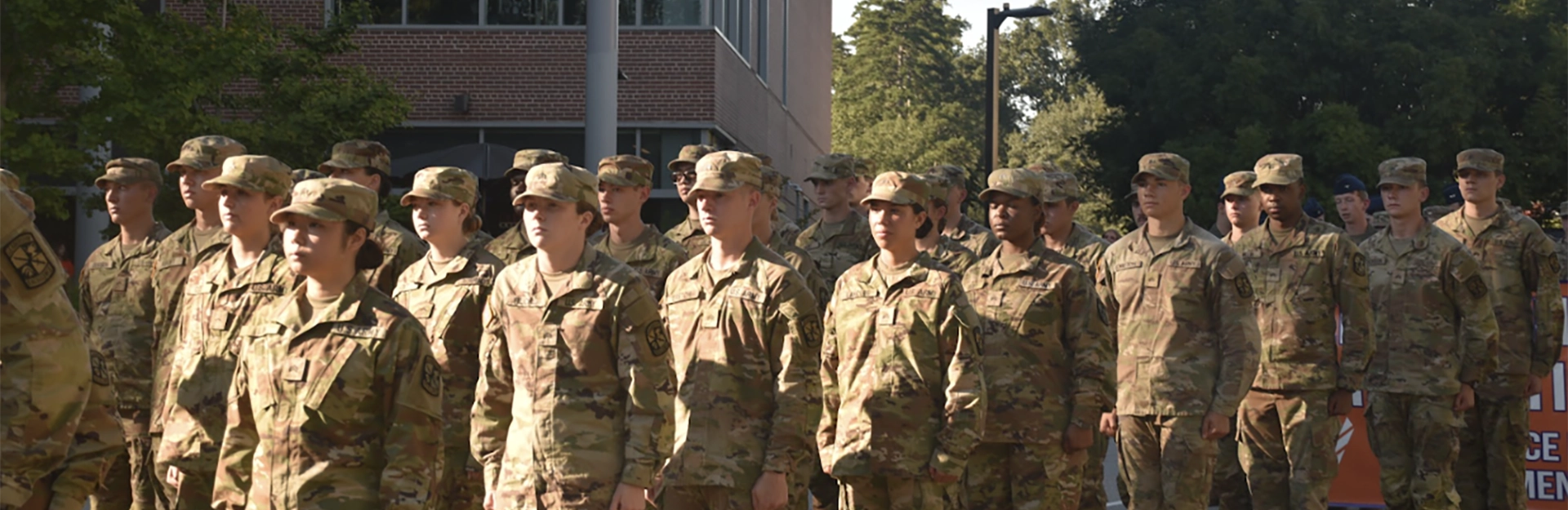 Cadets in camouflage marching.