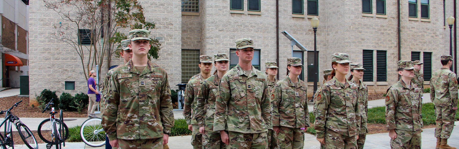 Three cadets posing for photo.