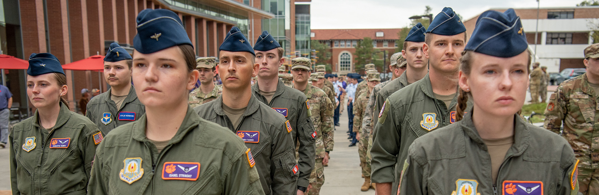 Many cadets lined up in uniform.