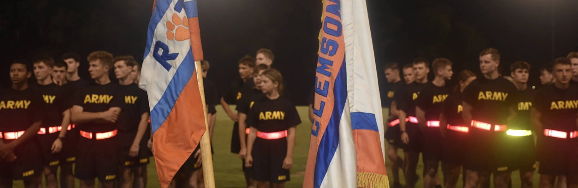Cadets in camouflage marching.
