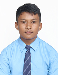 A school portrait of a young boy wearing a light blue shirt and dark tie.