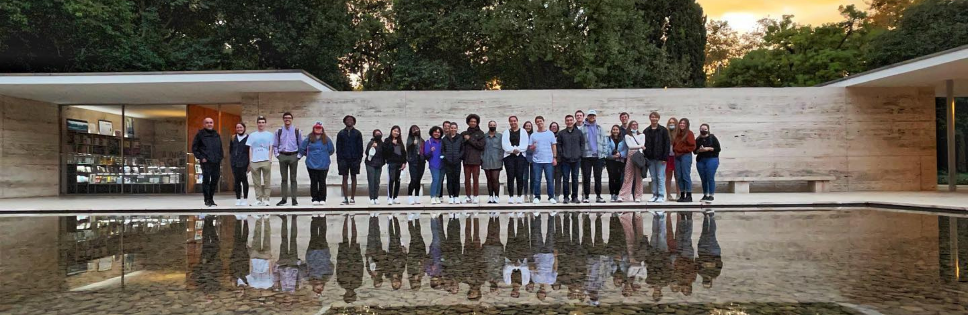 Students in Barcelona in front of water