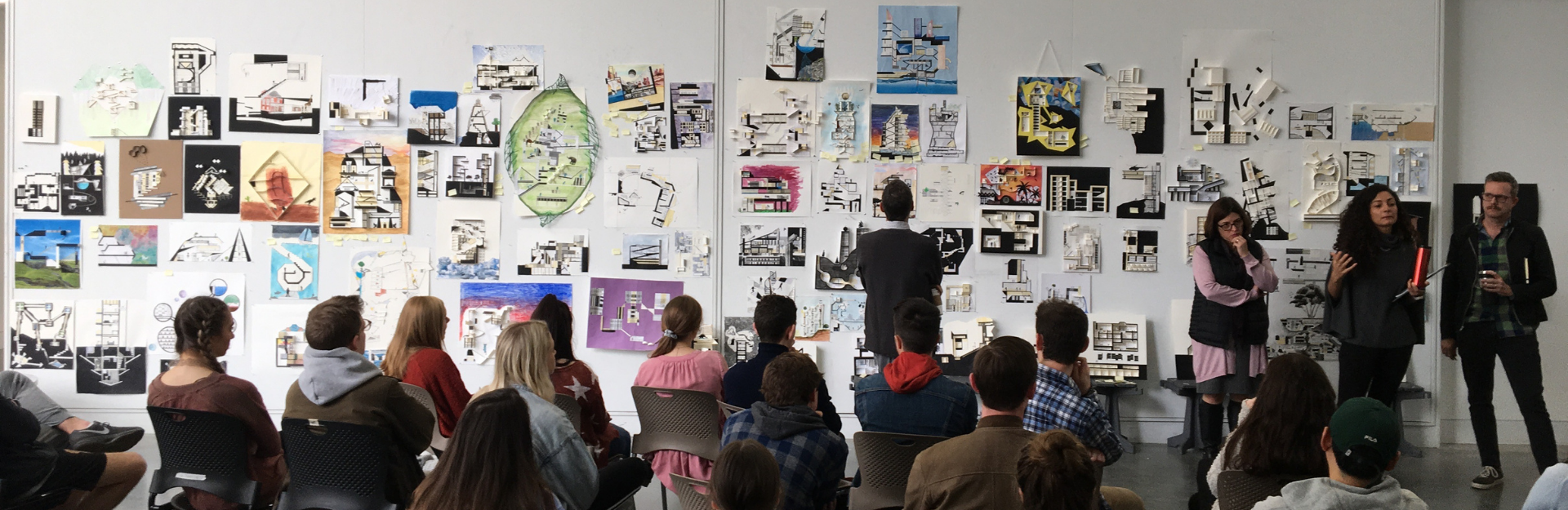 architecture studio review with students and professors