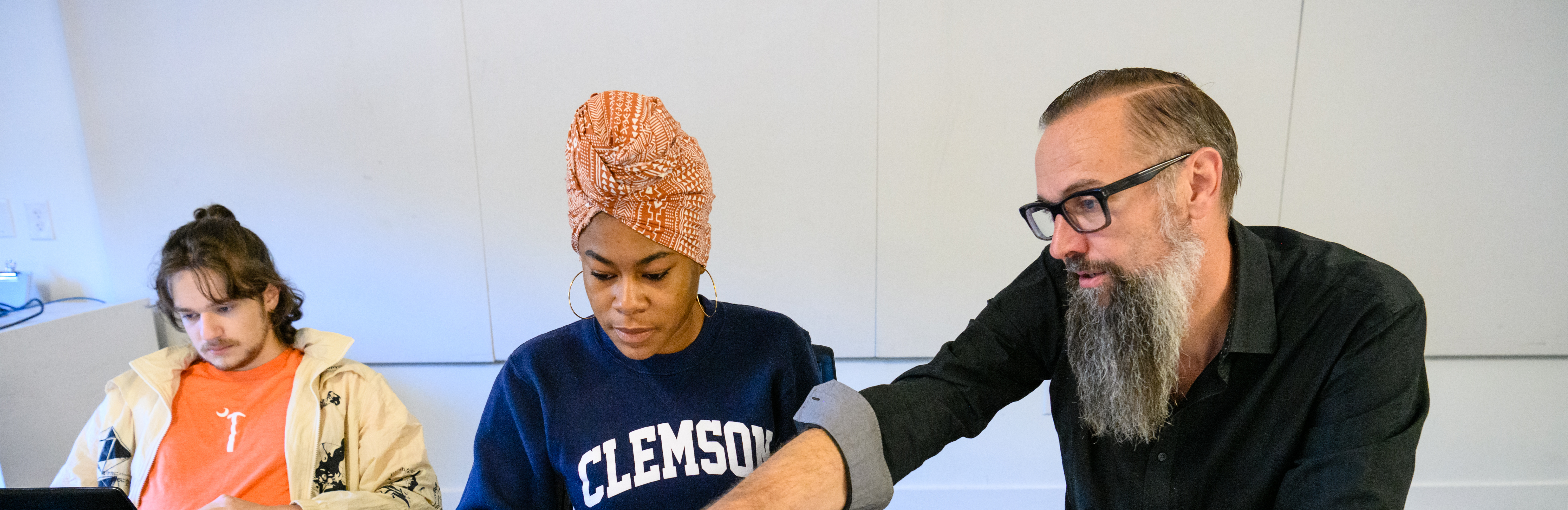 On right, Bradford Watson teaches an M.Arch student.