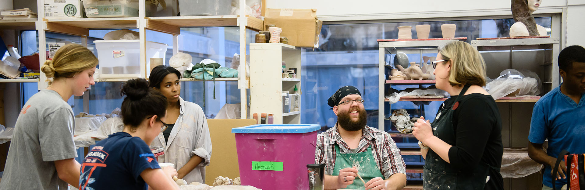 Image of students and faculty in art studio